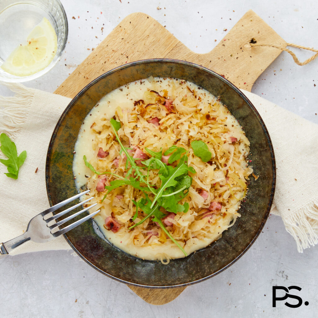 Sauerkraut-Stampf mit Schinkenwürfeln